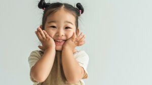 Happy Asian Child Smiles